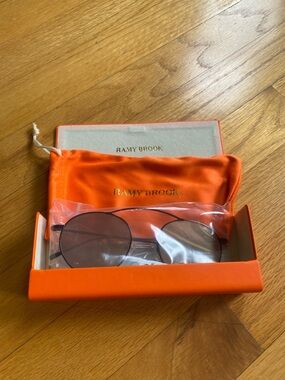 Ramy Brook Sunglasses in Black Round Frames.